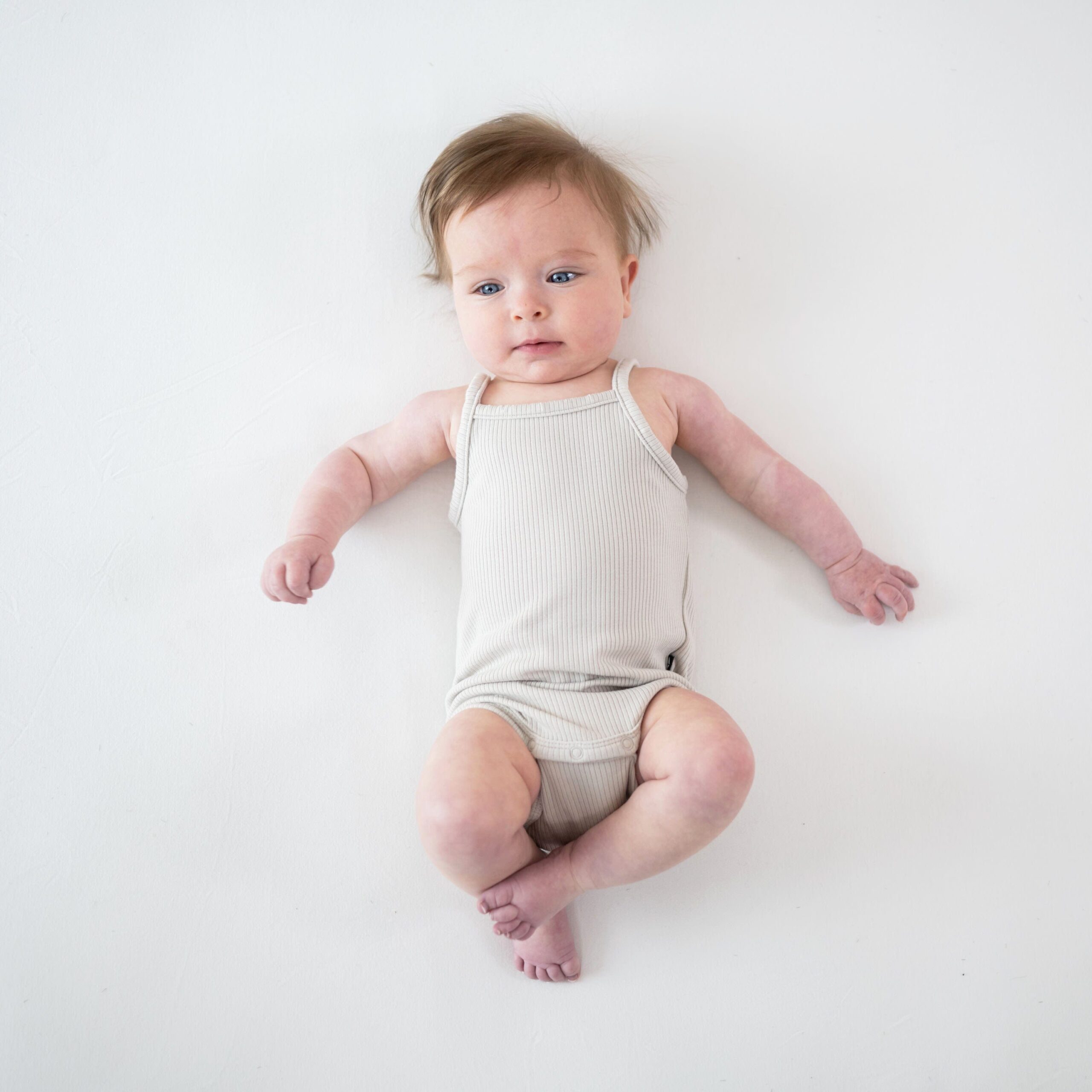 kyte-baby-ribbed-spaghetti-strap-bodysuit-ribbed-spaghetti-strap-bodysuit-in-oat-33303851171951
